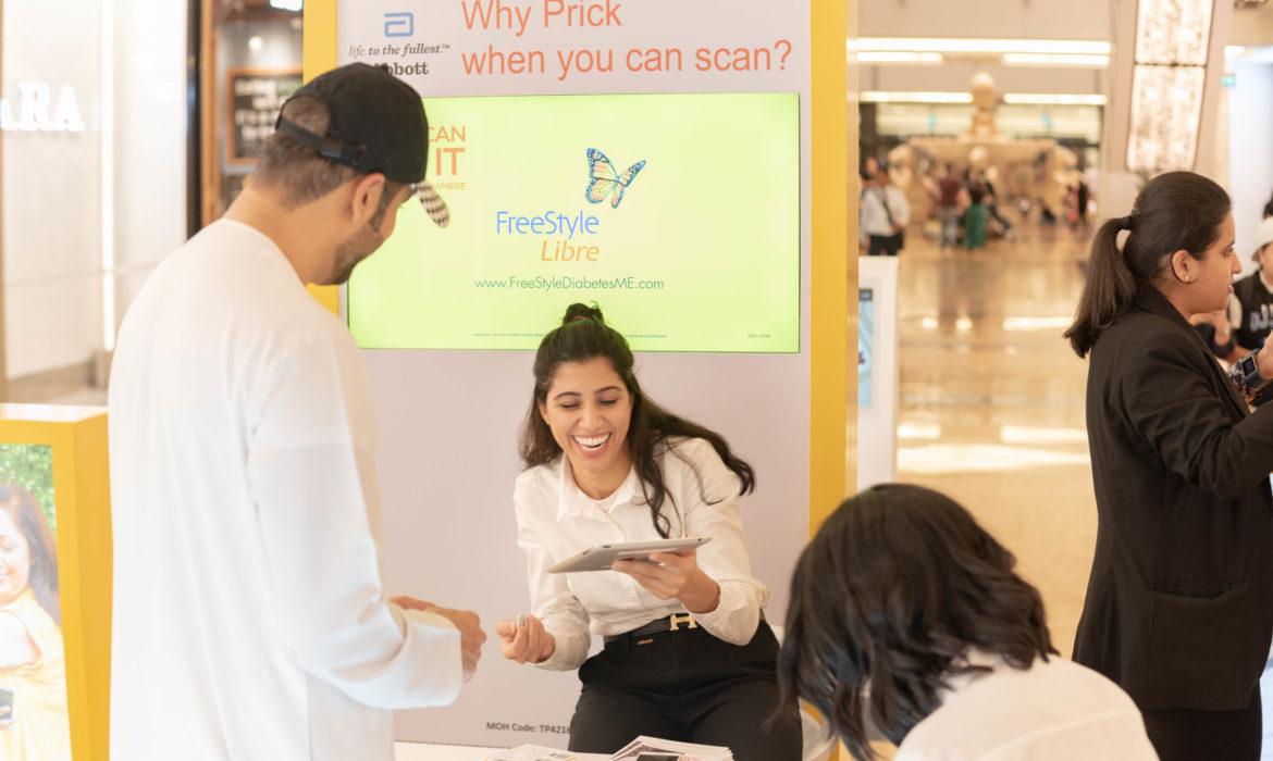 Shoppers engaging in a brand activation organized by Momentum Marketing and Events in Dubai